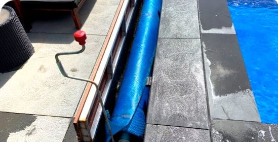 Manual Pool Cover System with Red Handle — Pool Cover Systems in Nowra, NSW