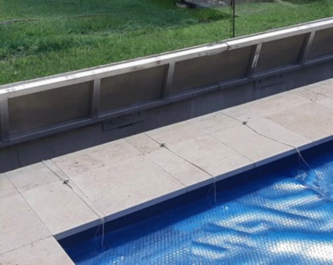 Underground Premium Travertine — Pool Cover Systems in Nowra, NSW