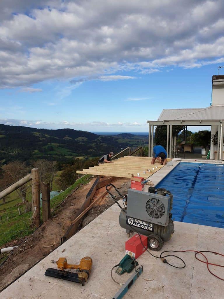 Photo of a Installing Flooring in Pool — Pool Cover Systems in Nowra, NSW