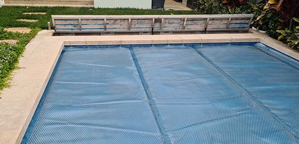 A Pool with Thick Cover — Pool Cover Systems in Brisbane, QLD