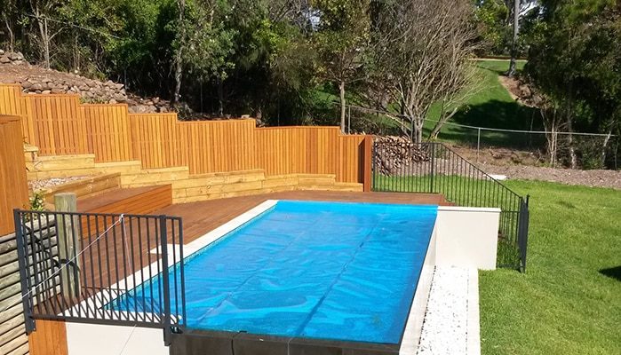 A Beautiful Deck with Pool — Pool Cover Systems in Nowra, NSW