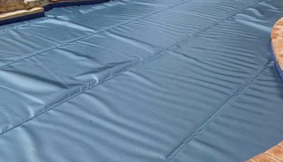 A Pool with Quality and Thick Blue Cover — Pool Cover Systems in Nowra, NSW