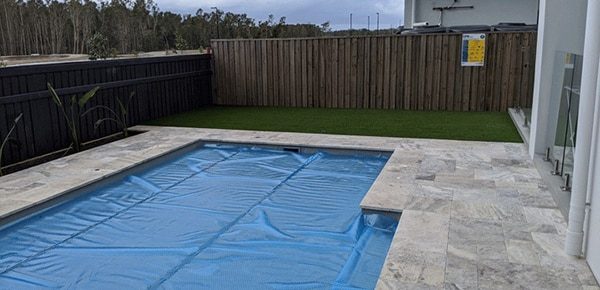 A House with Pool and Underground Cover System — Pool Cover Systems in Adelaide, SA