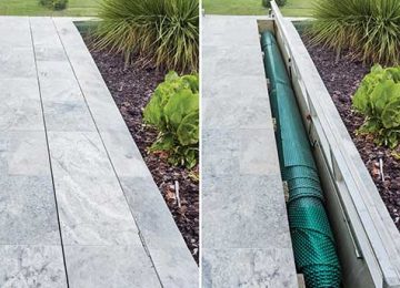 Garden with Green Hose on Grass — Pool Cover Systems in Nowra, NSW