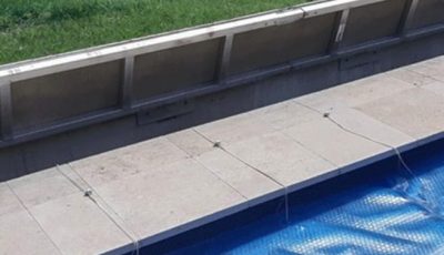 Underground Premium Travertine — Pool Cover Systems in Nowra, NSW