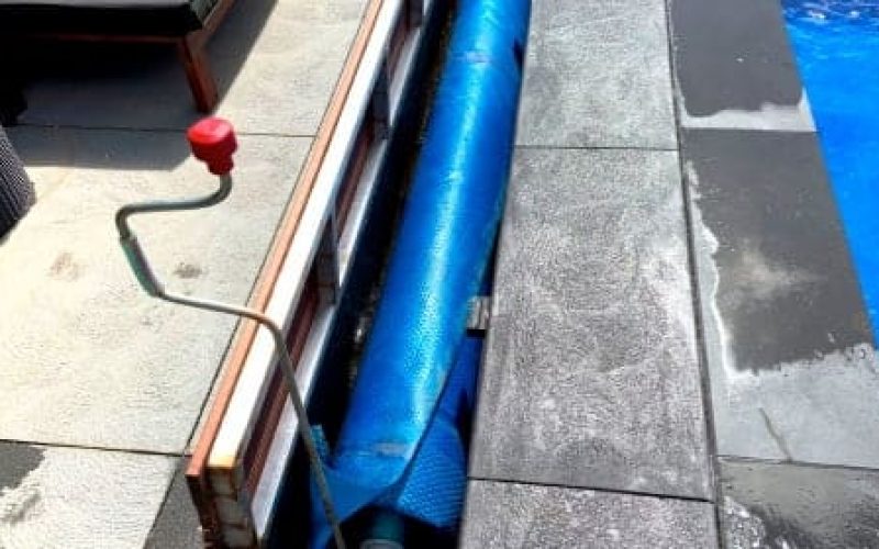 Manual Pool Cover System with Red Handle — Pool Cover Systems in Nowra, NSW